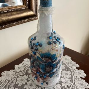 Decorated glass bottle